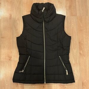 Calvin Klein puffer vest in black size small
